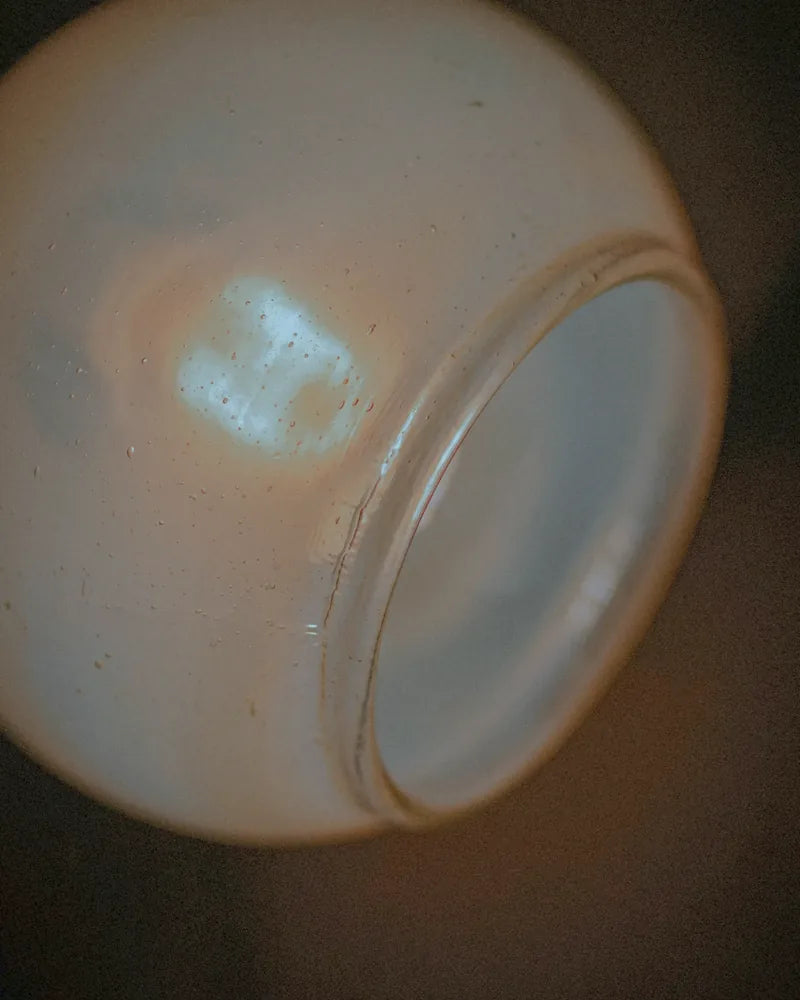 Macro, opaline glass glowing warm